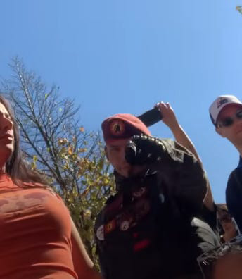 POV of Frances Widdowson when she was sitting on the ground and surrounded; Tre Delaronde of First Nations Indigenous Warriors